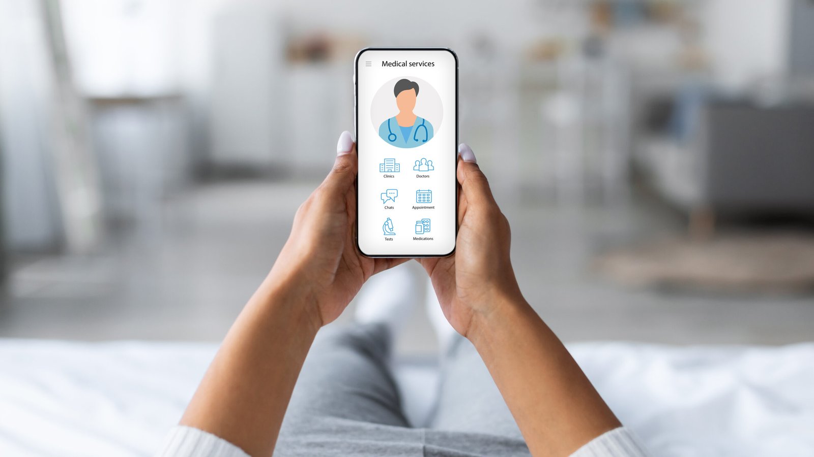 Unrecognizable woman laying on bed with mobile phone, using online medical application, chatting with doctor, home interior. Telemedicine software, modern technologies and healthcare concept