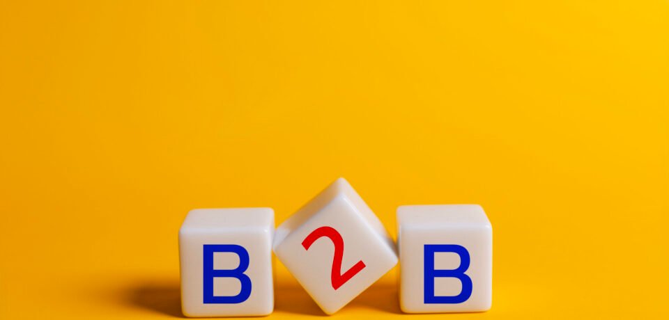 Concept of B2B, cubes with the abbreviation B2B, business and financial concept, B2B marketing.