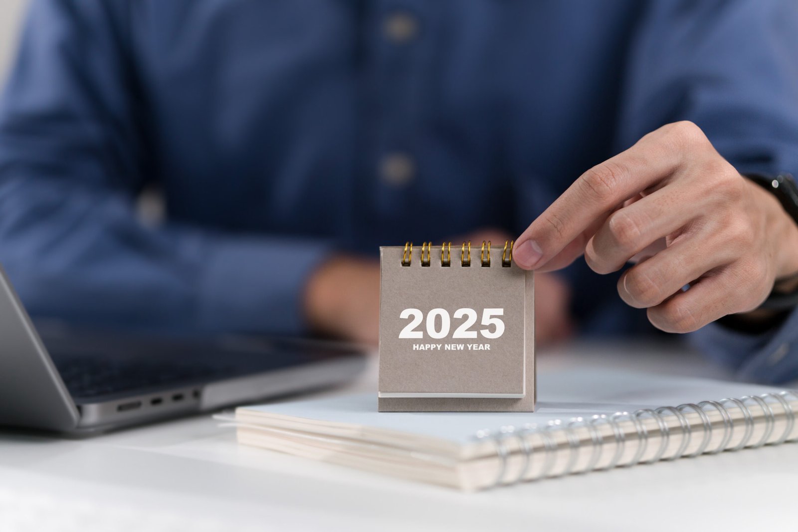 Man hand holding 2025 calendar. 2025 Happy New year background. Setup objective target business cost and budget planning of new year concept.