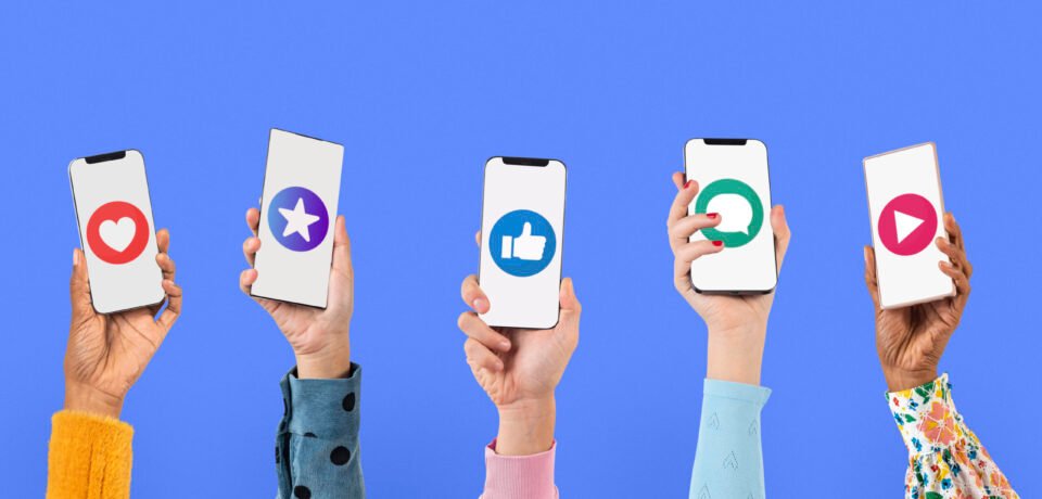 Smartphone screen hand with social media icons